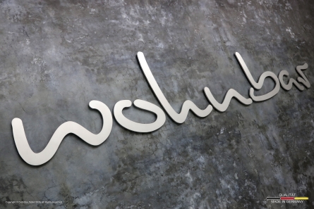 wohnbar - 3D-Logo aus geschliffenem Aluminium