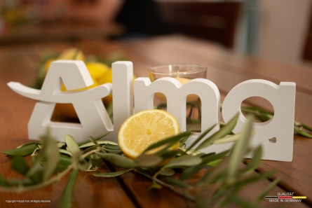 Alma - Tischaufsteller als Give-Aways