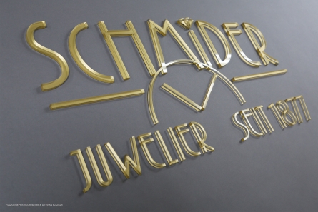 Juwelier-Logo und Buchstaben aus rückseitig gold lackiertem Acrylglas.