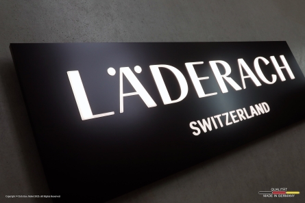 LÄDERACH SWITZERLAND - Lichtwerbung mit durchgesteckten Leuchtbuchstaben