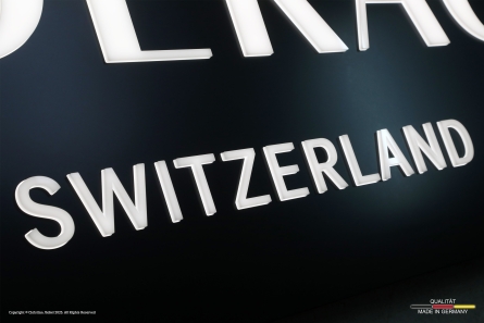 LÄDERACH SWITZERLAND - Lichtwerbung mit durchgesteckten Leuchtbuchstaben