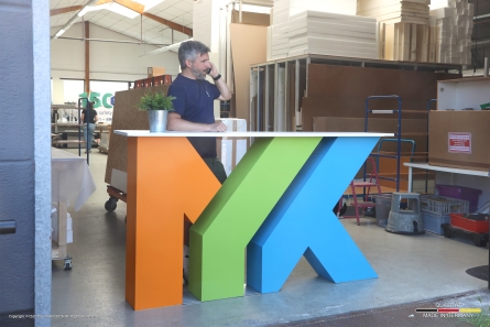 MYK - Logo-Theke aus stehenden Buchstaben