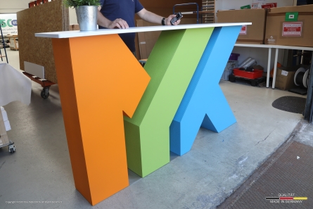 MYK - Logo-Theke aus stehenden Buchstaben